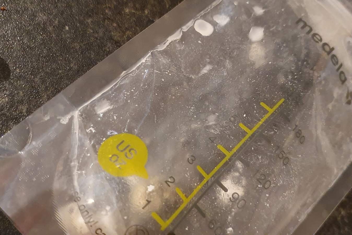 A close up shot of an empty breastmilk storage bag.